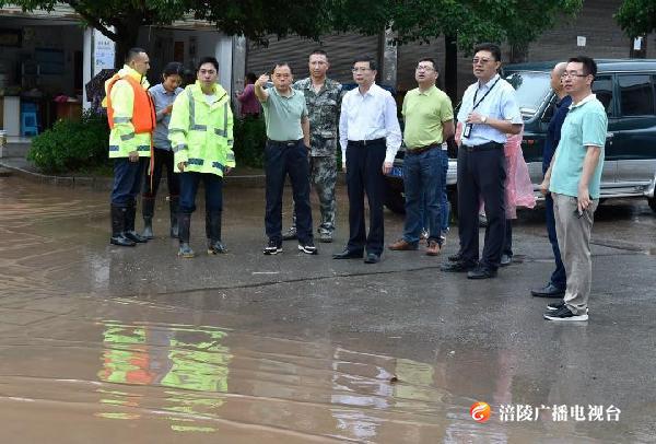 周少政到龙潭镇检查指导防汛救灾工作