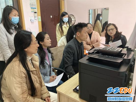 4.河南省财政厅一体化工程师刘津钊、王晓娟上机指导一体化系统操作