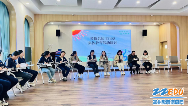 5张莉名师工作室主持人、郑州市实验幼儿园党总支书记、园长张莉（右四）与教师们亲切交流