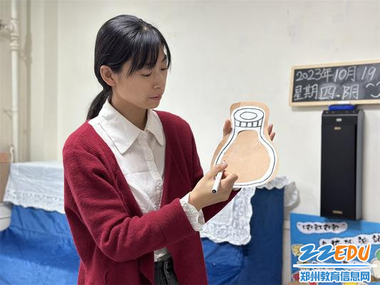 1.教师讲述粘种子的方法
